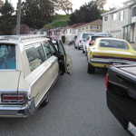 The Widman's arrive in their cool Mopar wagon.