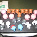 The penguins are out numbered by the pigs and monkeys.