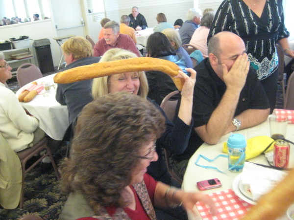 Darlene pinches a loaf right at the table.