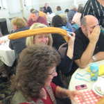 Darlene pinches a loaf right at the table.