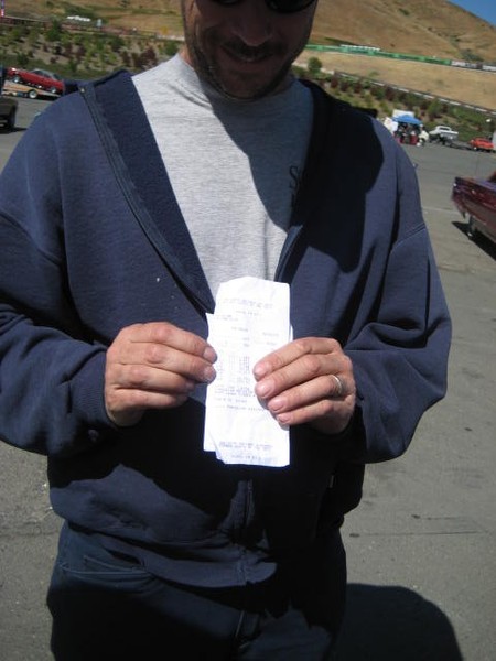 Jim Garcia shows off his time slips.