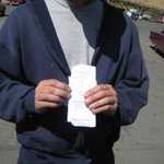 Jim Garcia shows off his time slips.