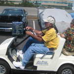 Carl give's Blackie a tour of the showcars.