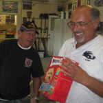 Rich hands out the parting gifts.