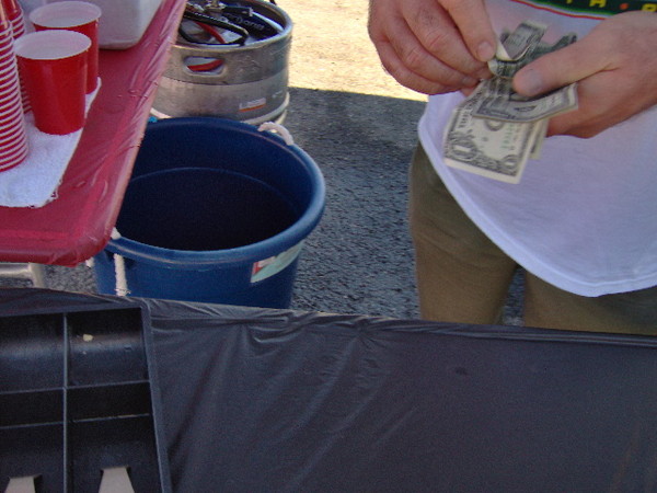 For three bucks they will let you have a cup of beer or a swig of the foam bucket.
