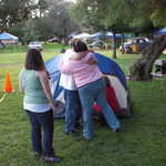 Hugs all around for a job well done.