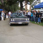 Sally drives our roadrunner through the winner's circle.