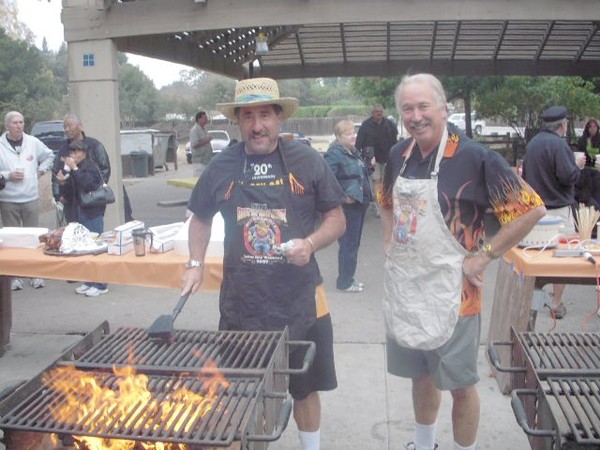Mark and Walt pitch in to do the grilling.