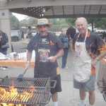 Mark and Walt pitch in to do the grilling.