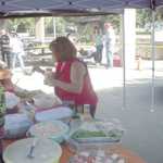 Cindy makes sure the food line will go smoothly.