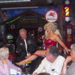 She said pull the garter down, not up!!