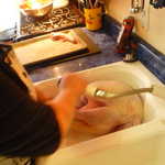 Thanksgiving 2008 and Sally gets the turkey all nice and bathed.