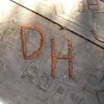 Must be someone who is an American League baseball fan. They carved in "Designated Hitter".