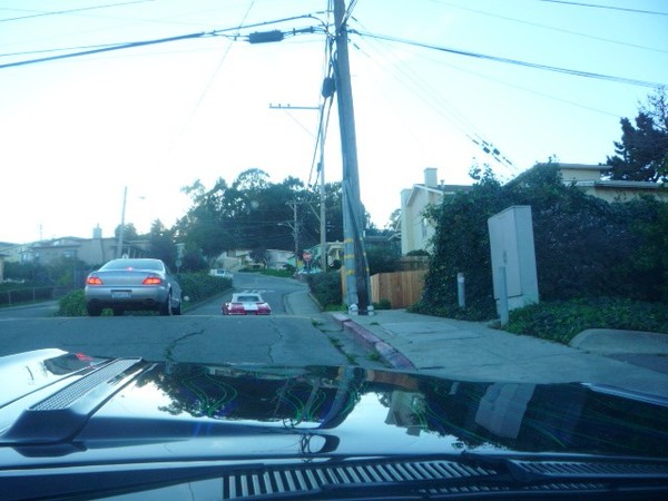 So on the way home from the Alpine Inn cruise we see this rag top Corvette a couple of blocks from our house. The lady driving it can not figure how to maneuver the clutch well enough to get it to make it all the way up the hill.