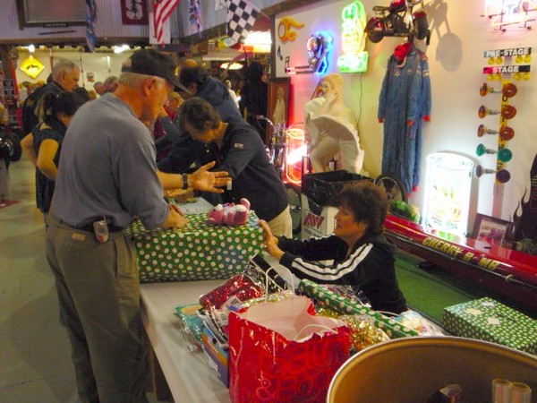 Toy wrappping at Sparky's Hot Rod Shop. 094