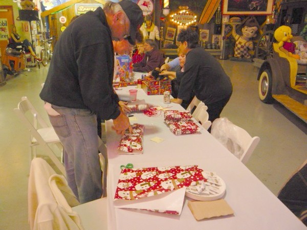 Toy wrappping at Sparky's Hot Rod Shop. 117