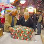 Toy wrappping at Sparky's Hot Rod Shop. 127