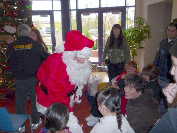 Santa arrives with lots of toys and treats for all the children.