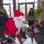 Santa arrives with lots of toys and treats for all the children.