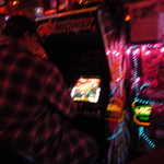 Miguel takes on the video game machine.