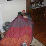 The massage chair is a welcome treat for a tired partygoer.