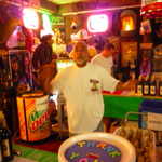 Our friendly bartender for the night, Carl is mucho happy to pour you a glass of good cheer.