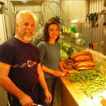 Everyone pitches in to help prepare the dinner.