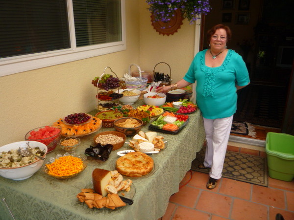 Our hostess Margarita shows off this great spread of goodies.