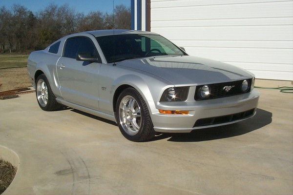 05 Stang
Just your basic GT with black leather, 5 speed, and MB Motorsport wheels. Think I should slip a factory supercharger under the hood?
