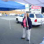 Bev helps set up the MPM/Moparts tent.