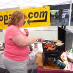 Bev pitches in for a little grilling duty.