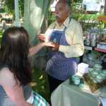 Deanna gets a hand massage at the Sonoma art fair.