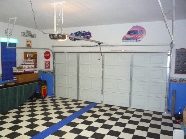 Standard type door tracks and center mounted electric opener.