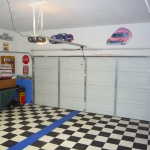 Standard type door tracks and center mounted electric opener.