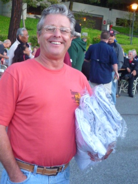 Smiling Bob your honest used T-shirt salesman.
