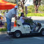 Deanna does her first driving of vechile in Carl's golf cart.