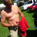 Phill makes his own wifebeater shirt right on site.
