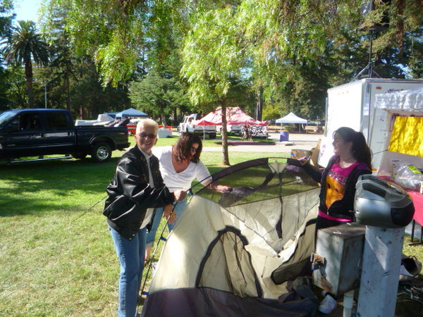 Tammy helps out getting the tent all ready.