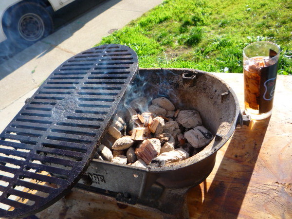 Coals are ready and so are the Hickory chips to add some flavor.
