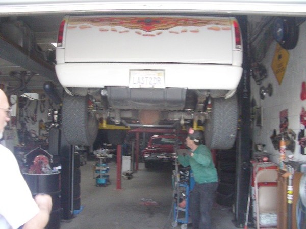 it's 0900 hours and Rich's truck is getting a new muffler installed.