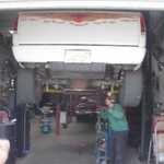 it's 0900 hours and Rich's truck is getting a new muffler installed.