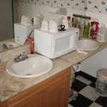 After using the bathroom you cna wash your hands and make popcorn too!
