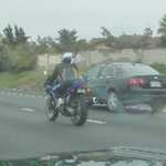 This guy's got golf clubs in his backpack...LOL!!