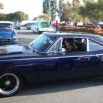 Sally arrives in the roadrunner.