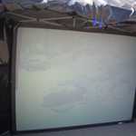 There was a big screen set up showing a movie all about Derrick's adventures.