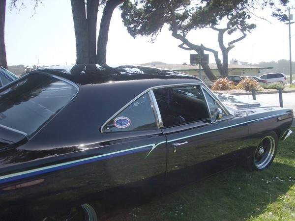 The sign says "Mopar Parking Only".