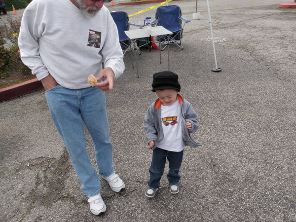 Carl and his grandson inspect the show for lowriders!