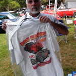 Carl shows off the shirts for the 2010 Car Crazy Promotions car show on August 14th.
