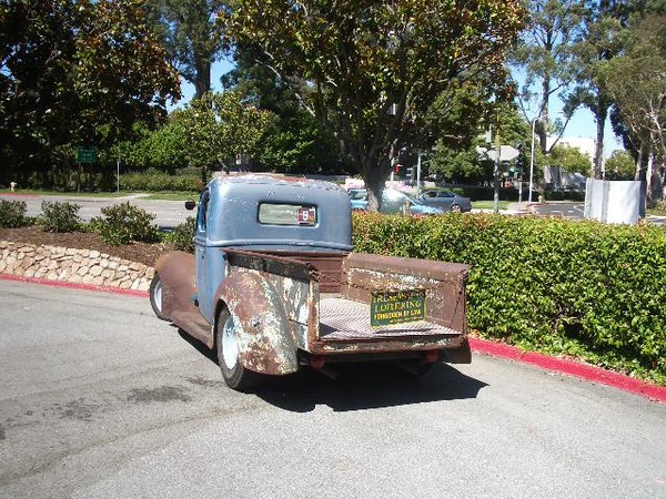 Rick gets his custom truck ready for tomorrow's big show by waxing it with 80 grit sandpaper.
