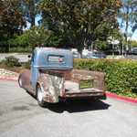 Rick gets his custom truck ready for tomorrow's big show by waxing it with 80 grit sandpaper.
